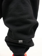 Black sweatshirt with a 'Made in New York" label on a white background