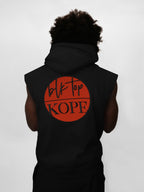 Person wearing a black sleeveless hoodie with an orange logo on the back against a white background